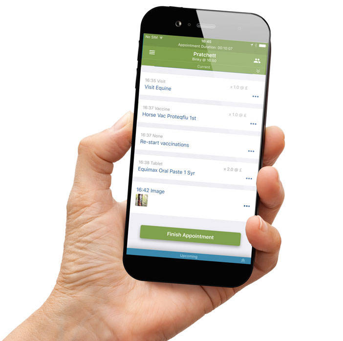 A hand holding a smartphone displaying an app