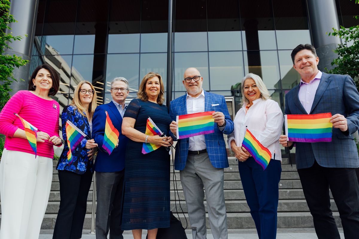 AmerisourceBergen executive leaders celebrating Pride Month 2023 on the steps of their Conshohocken, Pennsylvania headquarters