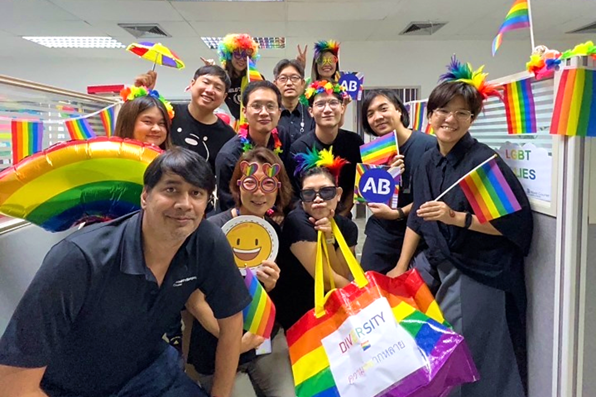 A group of coworkers celebrating Pride Month 2023 in the Thailand office