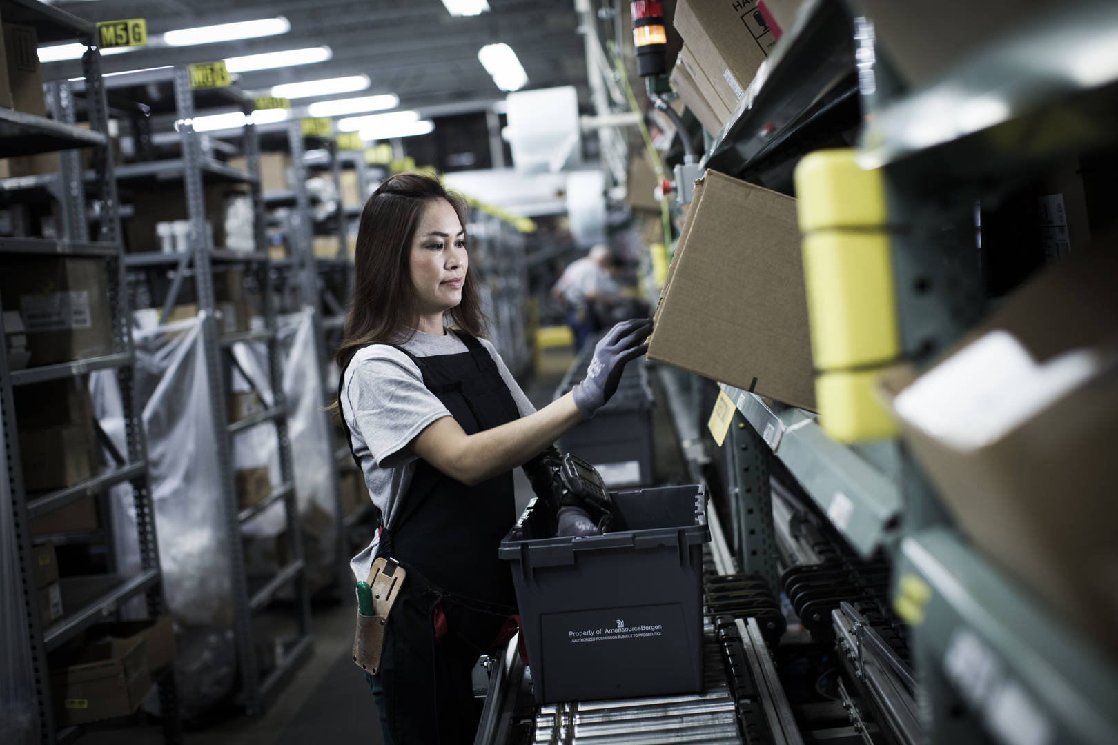 Distribution Drug picking area with female employee