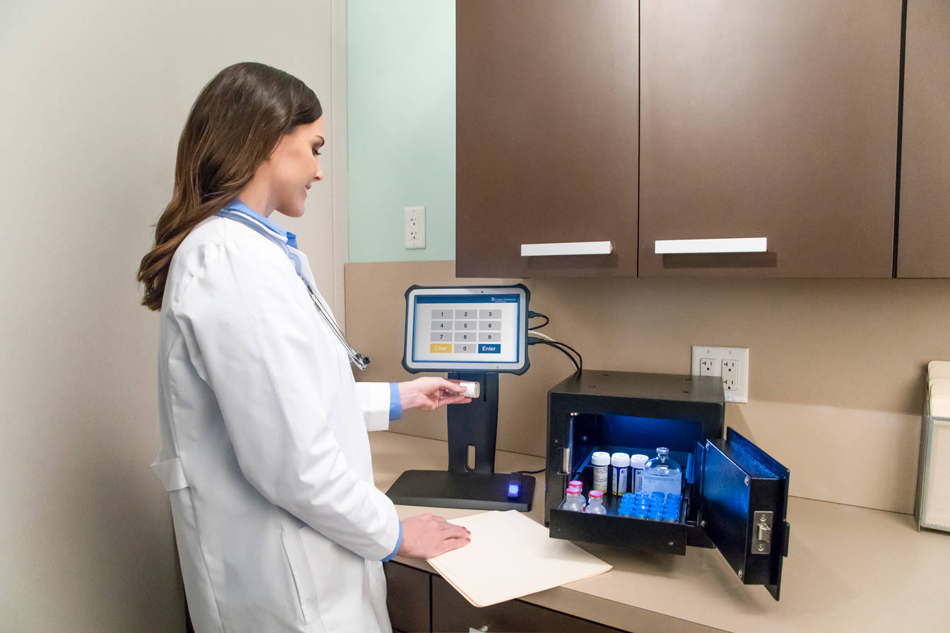 Doctor scanning a vial from CubixxVault