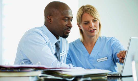 business man with healthcare worker