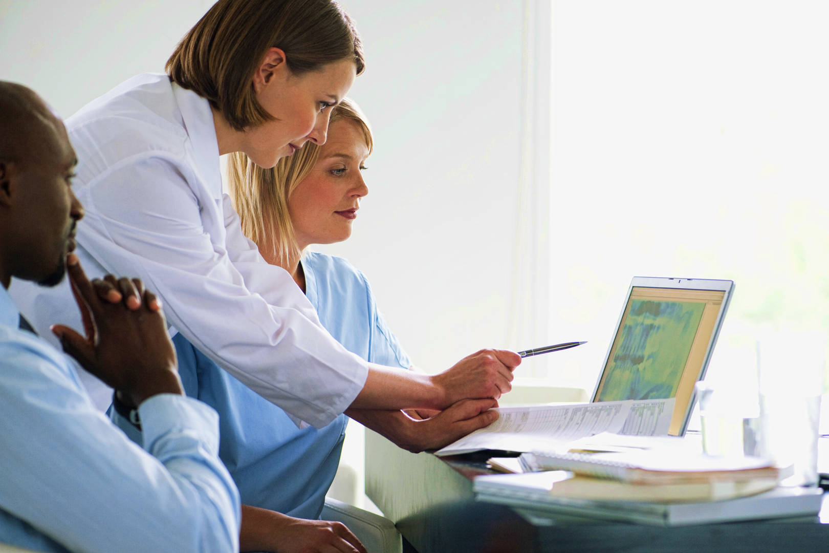 healthcare group looking at screen