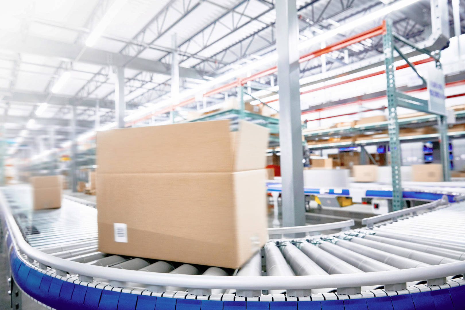 Box on conveyor belt in distribution center