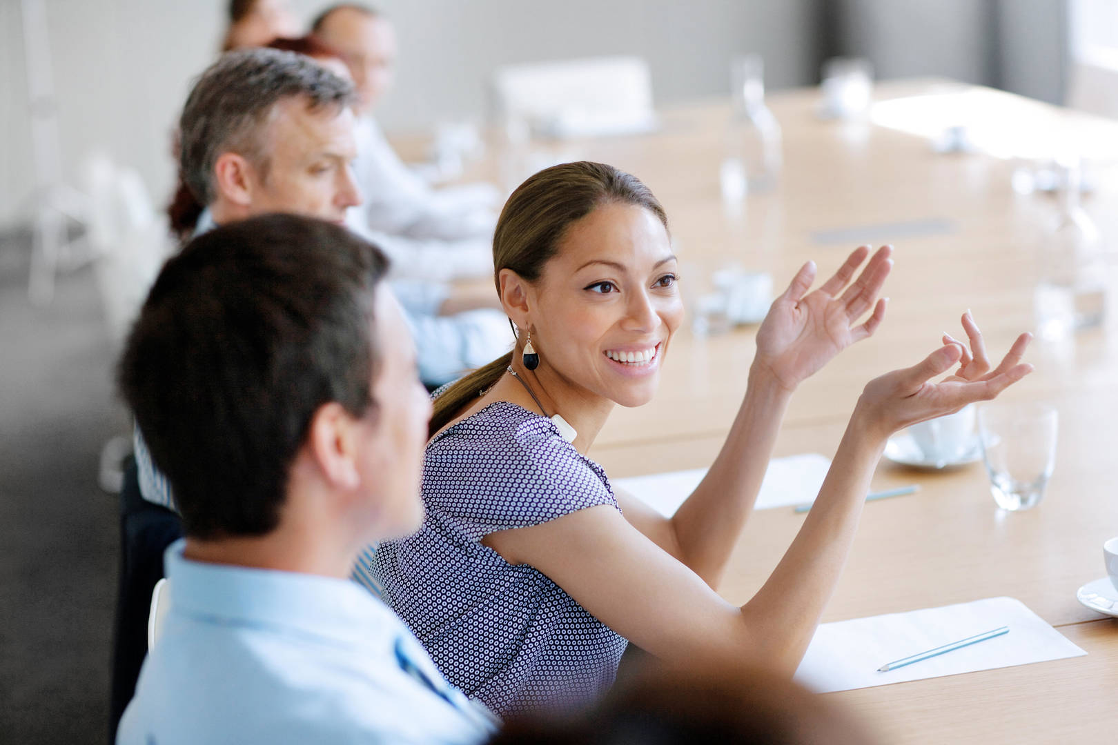 Diverse young coworkers at business meeting