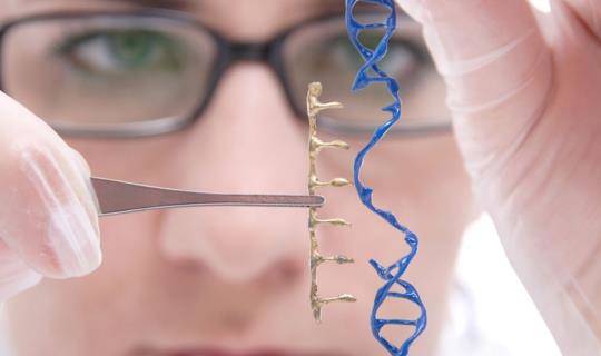 Lab tech with DNA
