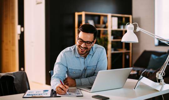formulary decisions enterprise man working on computer