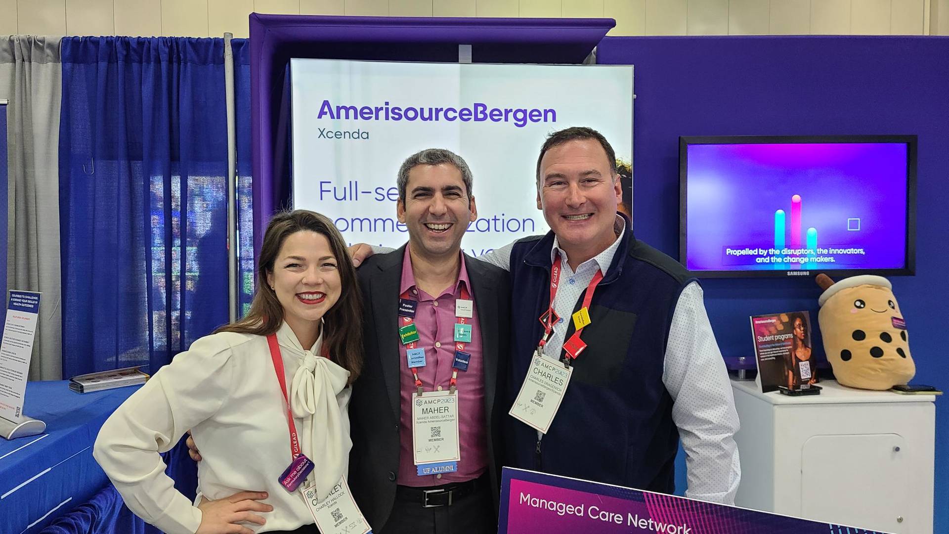 Team members at the AMCP 2023 exhibit