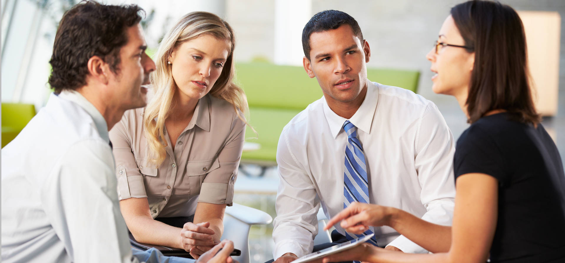 4 people having a discussion