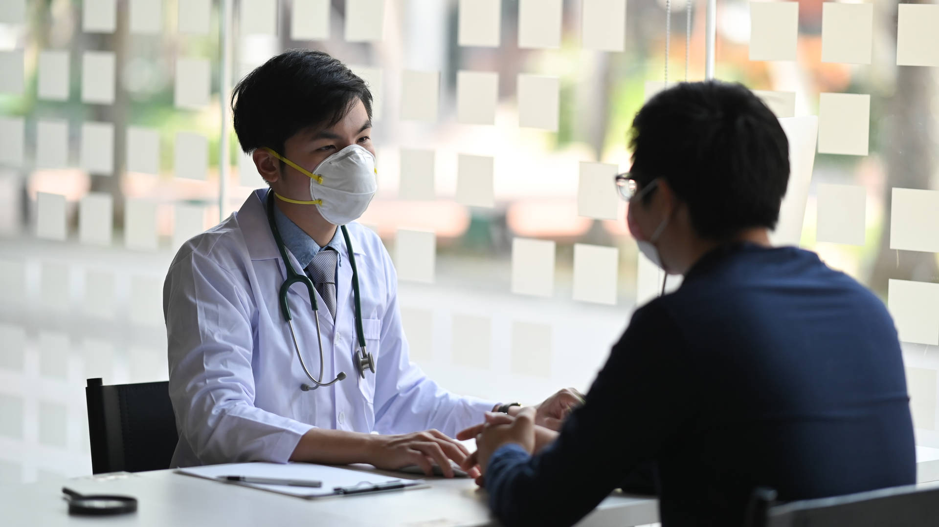 Doctor talking to patient